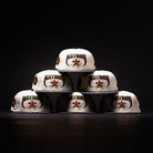 Six white Undaground 22WS Chrome Houston Astros New Era Hat 5950 Fitted hats are arranged in a pyramid shape against a dark background. These hats feature colorful embroidered logos and details as part of the Chrome Undaground collection.