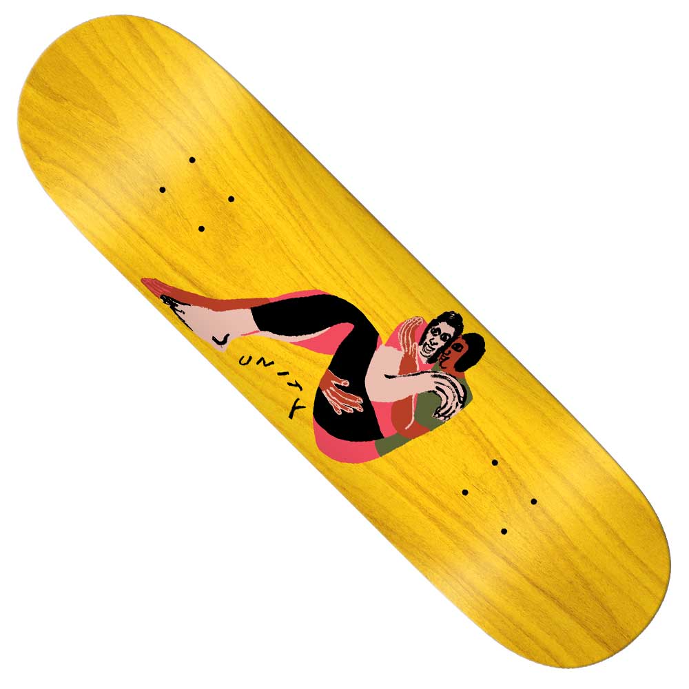 The Unity 8.5 With You Slick Skateboard Deck is yellow and features an illustration of two people wrestling, one in a headlock, with the word JUNY beside them.