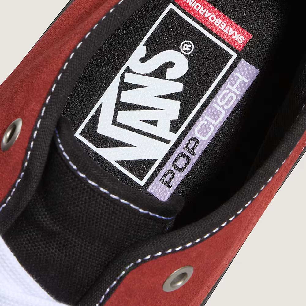 Close-up of Vans Authentic Mid VN000EEQGWR1 in Poppy Ember Red suede, showing black insole with white VANS logo and purple POP CUSH. Features include metal eyelets, white stitching, and vulcanized rubber outsole for skateboarding.