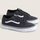 A pair of charcoal gray Vans Rowan VN0A5JICH911 suede sneakers with white soles, white side stripes, and black laces, displayed on a light background—perfectly blending classic style with the durability you expect from a top skate shoe.