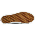 The image shows the sole of the Vans Skate AVE Classic Black White VN000Y1NBA2 Suede Skateboard Shoes, featuring a white upper, a brown waffle-patterned tread for grip, durable Wafflecup construction, and a small red tag visible at the heel.