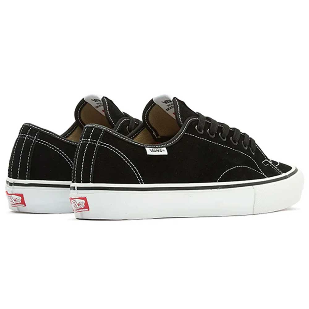 A pair of Vans Skate AVE Classic Black White VN000Y1NBA2 suede skateboard shoes with white stitching, white soles, and a red Vans logo on the heel, featuring DuraCap reinforcements for added durability, positioned side by side and facing slightly away.