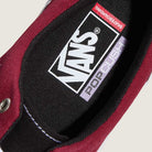 Close-up of the Vans Skate Era Black Dark Red VN000ECRBDK1 suede rubber shoe interior, featuring a black insole with white Vans logo, PopCush label, Skateboarding text by the heel, and a padded collar for comfort.