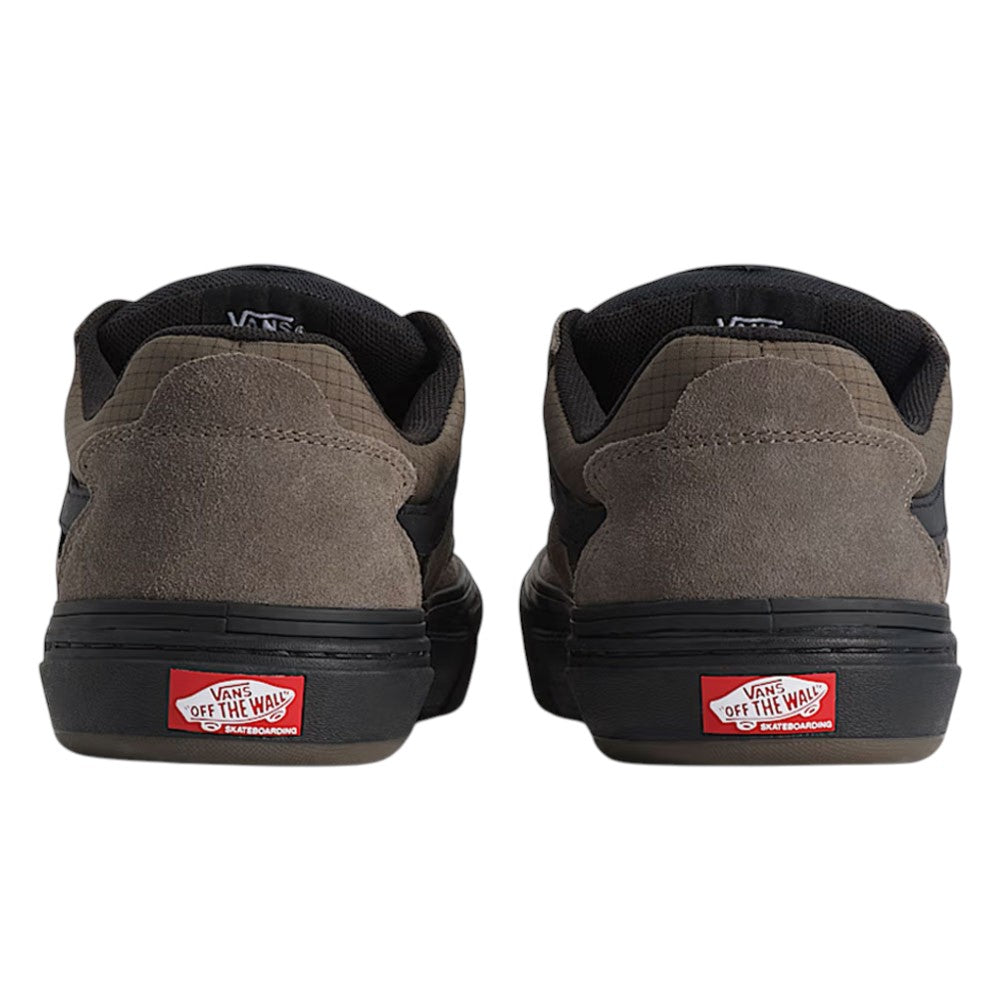 Back view of charcoal and black Vans Skate Kyle Walker Wafflecup Ripstop Bungee VN000DA49JC Suede Rubber Skateboarding shoes, featuring low-top silhouettes and red branding on the heels.