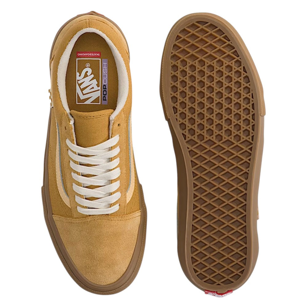 A top-down view of a brown Vans Skate Old Skool Autumn Brown VN000EDNGR8 Suede Rubber Skateboarding Shoe displayed next to its brown rubber waffle-treaded sole.
