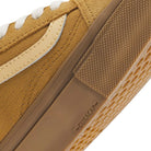 Close-up of a brown Vans Skate Old Skool Autumn Brown VN000EDNGR8 Suede Rubber Skateboarding Shoe, featuring a textured rubber toe cap and a waffle tread sole.