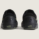 Rear view of Vans Skate Half Cab Walnut Gum VN0A5FCD77J1 suede skateboard shoes with green accents, SUP and EME embossed on the heels, PopCush impact protection for comfort, and Vans Off The Wall logo on the sole.