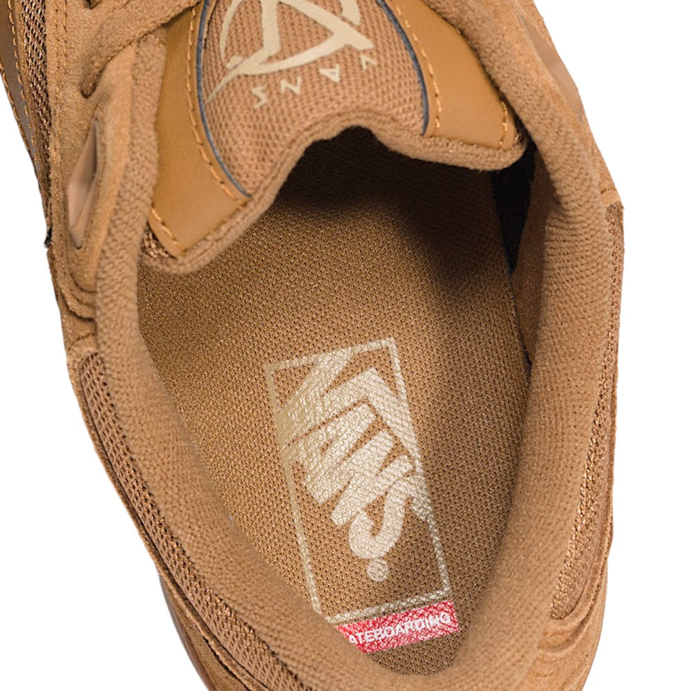 Close-up view of the inside heel area of the Vans Skate Rowan Z3 VN000V74GWT Chipmunk Suede Skateboard Shoes, highlighting the Vans logo on the insole and a small red ULTRACUSH tag near the heel for added impact protection.