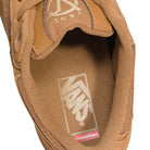 Close-up view of the inside heel area of the Vans Skate Rowan Z3 VN000V74GWT Chipmunk Suede Skateboard Shoes, highlighting the Vans logo on the insole and a small red ULTRACUSH tag near the heel for added impact protection.