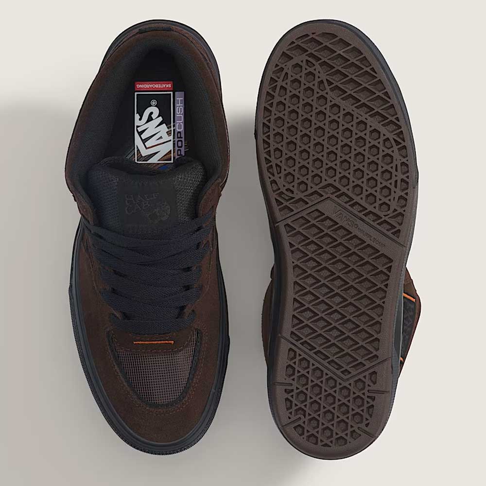 The Vans Wafflecup Half Cab Rizzo Brown Black VN000D9ZY491 Suede Skate Shoes are shown from above; one displays black laces and branding, while the other highlights the signature textured Wafflecup rubber sole.