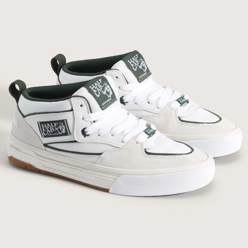 A pair of Vans Skate Half Cab Walnut Gum VN0A5FCD77J1 suede skateboard shoes with black laces, gum soles, PopCush impact protection, and the Half Cab logo on the side and tongue, displayed on a neutral background.