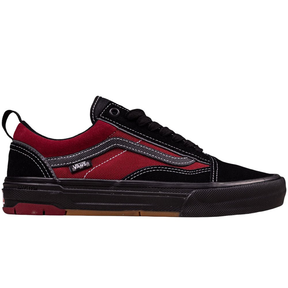 The Skate Old Skool Wafflecup Black Red VN000EB7Y091 by Vans features black suede, red canvas panels, white stitching, a durable DuraCap black rubber sole, black laces, and the iconic Vans side stripe and label.