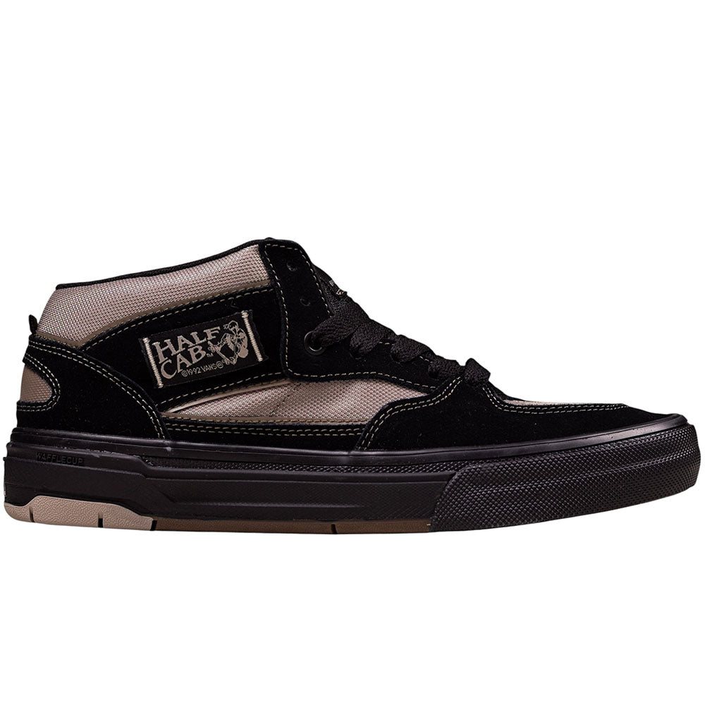 The Wafflecup Half Cab Black Peyote VN000D9ZOUK1 Vans Suede Skate Shoes feature black and brown suede overlays, black laces, a visible HALF CAB patch, and a durable WaffleCup sole with a black edge and brown bottom.