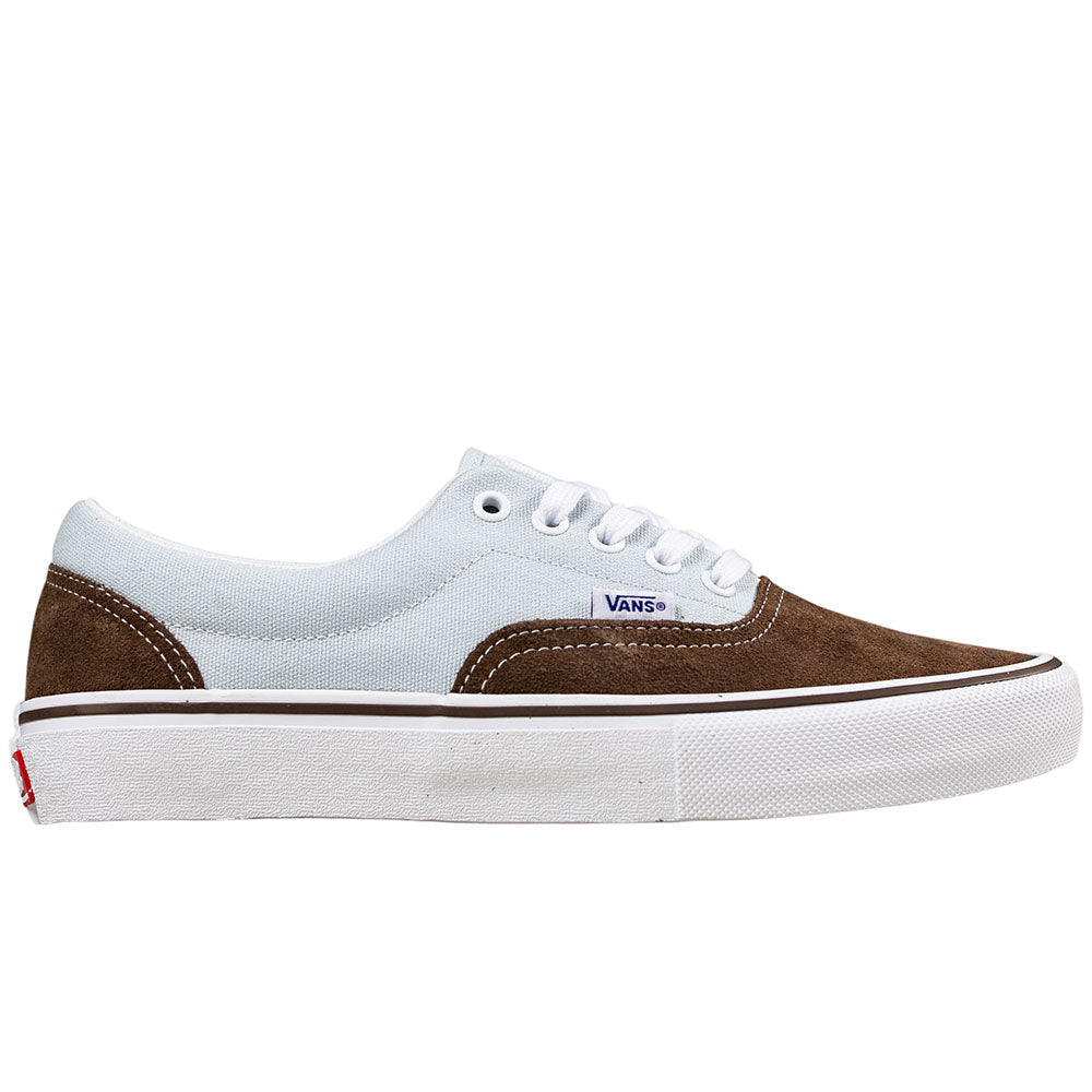 The Vans Skate Era Brown Blue VN000ECRCL11 features a brown suede toe and heel, white canvas sides, white laces, a white rubber sole with a thin brown stripe, and the Vans logo tag—classic style meets modern skate tech.
