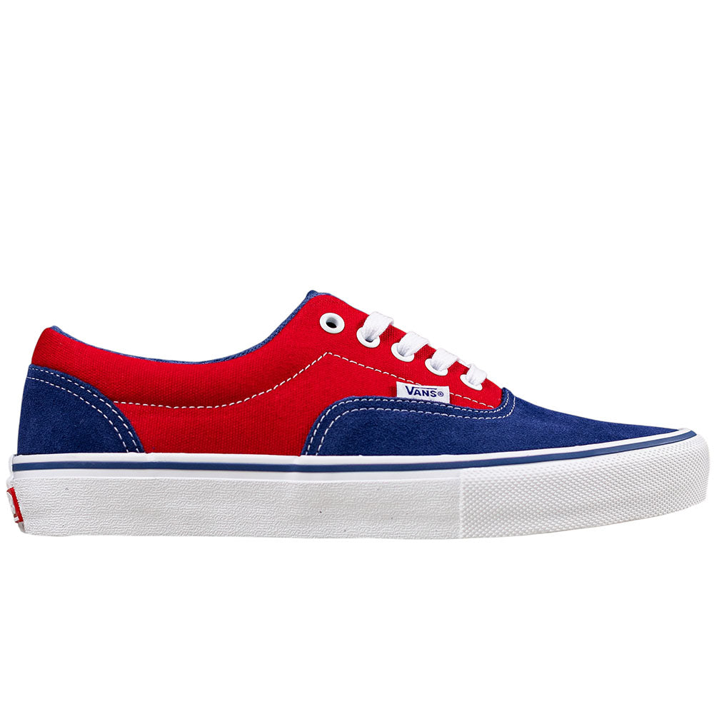 The Vans Skate Era Blue Red VN000ECR3QG1 features red and blue suede, white laces, white stitching, a grippy white rubber sole, and a visible Vans logo tag on the side. Shown in left profile view.