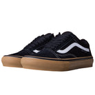 A pair of Vans Skate Old Skool Black Gum White VN000EDNB9K1 sneakers with black suede, white side stripes, and brown gum rubber soles, viewed at an angle from the front left.