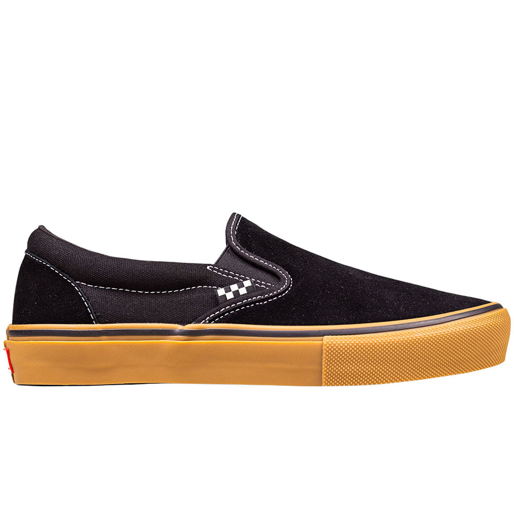 The Vans Skate Slip On VN000EG5B9K1 Black Gum Suede Shoes feature white stitching, a subtle checkerboard pattern, and a thick gum sole—built for durability and ideal for skateboarders seeking long-lasting footwear.