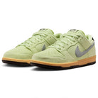 The Verdugo Mountain Dunk Low Pro HQ1626300 sneakers feature light liquid lime suede, wolf grey swooshes, tan midsoles, and black outsoles—classic Nike SB style with a fresh modern twist.