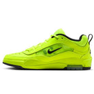 A side view of the Nike SB Air MAX Ishod Volt Black IB6212701 skate shoe, featuring a neon yellow upper, black sole, inner lining, and Swoosh logo. The modern design offers Max Air cushioning for superior comfort on and off the board.
