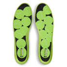 A pair of lime green insoles for the Volt Black IB6212701 Air MAX Ishod Nike SB Skateboarding Shoes, featuring a tennis ball pattern and a small rectangular ISHOD label near the heel.