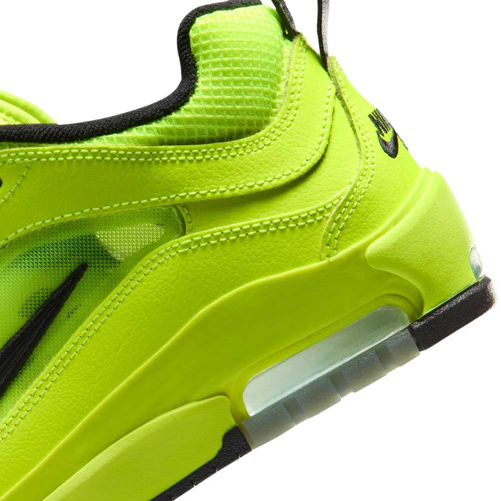 Close-up of the Volt Black IB6212701 Air MAX Ishod Nike SB Skateboarding Shoe with black accents, showing visible Max Air cushioning and textured mesh and leather on the heel and side.
