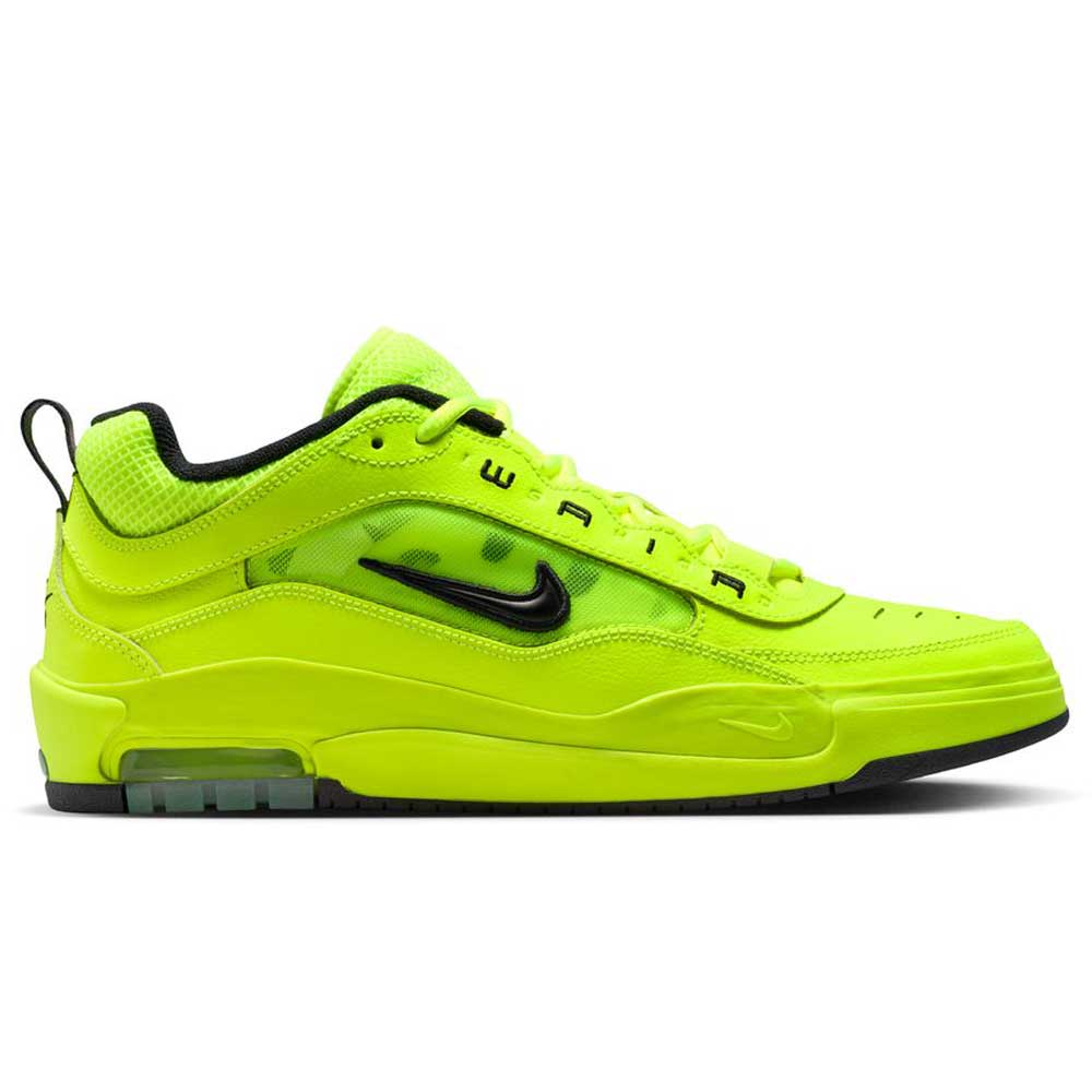 A side view of the Volt Black IB6212701 Air MAX Ishod Nike SB Skateboarding Shoes, featuring neon yellow with black accents, Max Air cushioning in the sole, a black Swoosh, low-top design, and skate-inspired textured details.