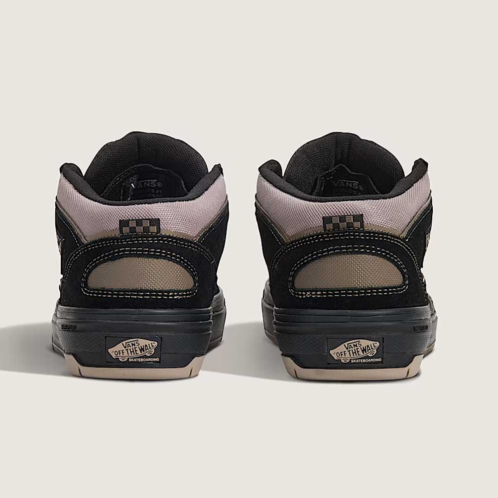 The Vans Wafflecup Half Cab Black Peyote VN000D9ZOUK1 suede skate shoes are mid-tops with black and tan colors, visible stitching, checkerboard accents near the top, and Off The Wall logos on each heel.