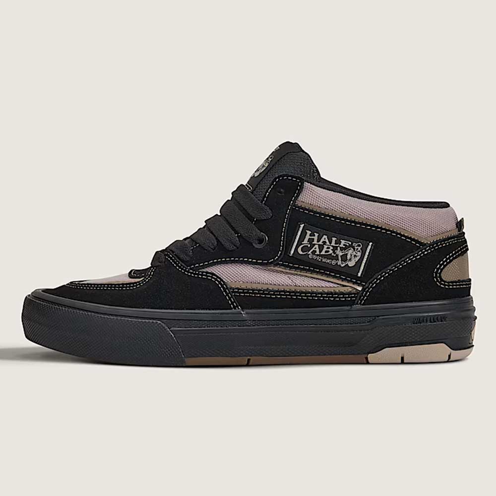 The Vans Wafflecup Half Cab Black Peyote VN000D9ZOUK1 suede skate shoe is shown from the side, featuring black and grey suede, canvas panels, a thick black WaffleCup sole, and HALF CAB branding on the side.