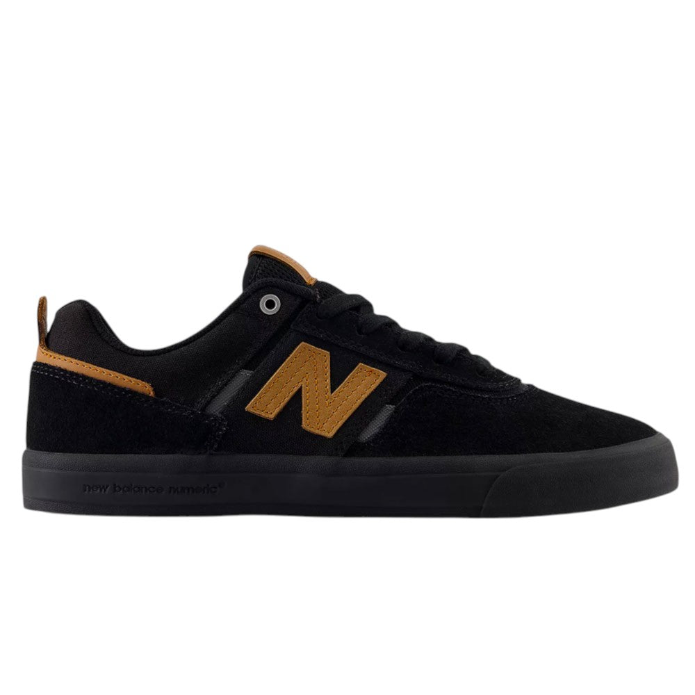 A white and black suede skateboarding shoe with a vulcanized sole, featuring the 306 BON design and a prominent “N” logo on the side—this is the New Balance Numeric White Black 306 BON pro model skate shoe.
