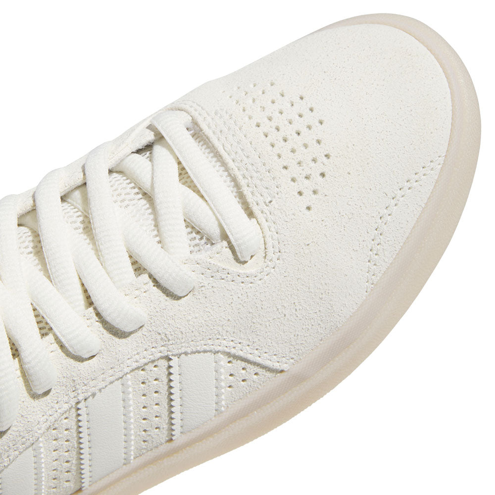 Close-up of the White White KJ0192 Tyshawn Adidas Skateboarding Leather Shoes, showcasing a textured suede and premium leather upper, perforated toe area, white laces, and a translucent rubber sole—perfectly capturing the signature style of Tyshawn skateboarding footwear.