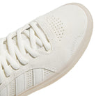 Close-up of the White White KJ0192 Tyshawn Adidas Skateboarding Leather Shoes, showcasing a textured suede and premium leather upper, perforated toe area, white laces, and a translucent rubber sole—perfectly capturing the signature style of Tyshawn skateboarding footwear.