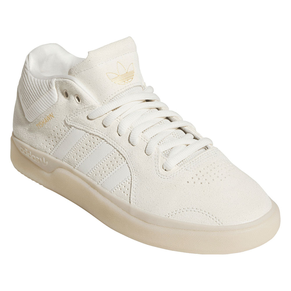 Introducing the White White KJ0192 Tyshawn Adidas Skateboarding Leather Shoes—these sneakers feature an off-white, suede-textured and premium leather upper, three white side stripes, gold “Forum” text detailing, and the classic Adidas logo on the tongue. Inspired by traditional skateboarding shoes, they are finished with a beige sole and crisp white laces.