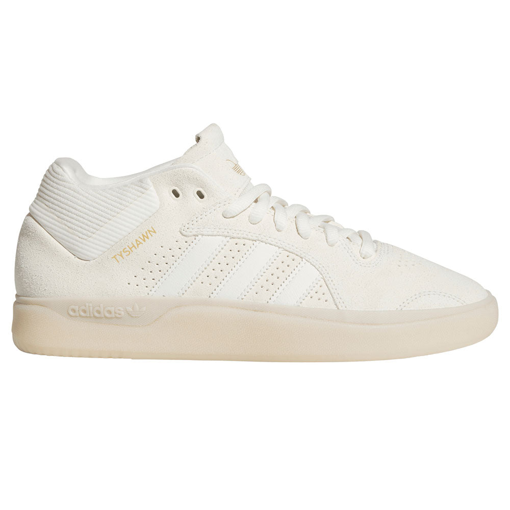 Introducing the White White KJ0192 Tyshawn Adidas Skateboarding Leather Shoes, featuring a premium white leather upper, gold TYSHAWN lettering, signature three side stripes, and a beige sole—seen from the side. Ideal for those seeking stylish and high-performance skateboarding footwear.