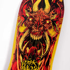 Close-up of the Winkowski Primeval Pro Shaped 10.34in x 30.54in Santa Cruz Deck, featuring vivid artwork of a demonic face with horns, sharp teeth, glowing eyes in red, yellow, and black; “Winkowski Primeval” appears at the bottom.