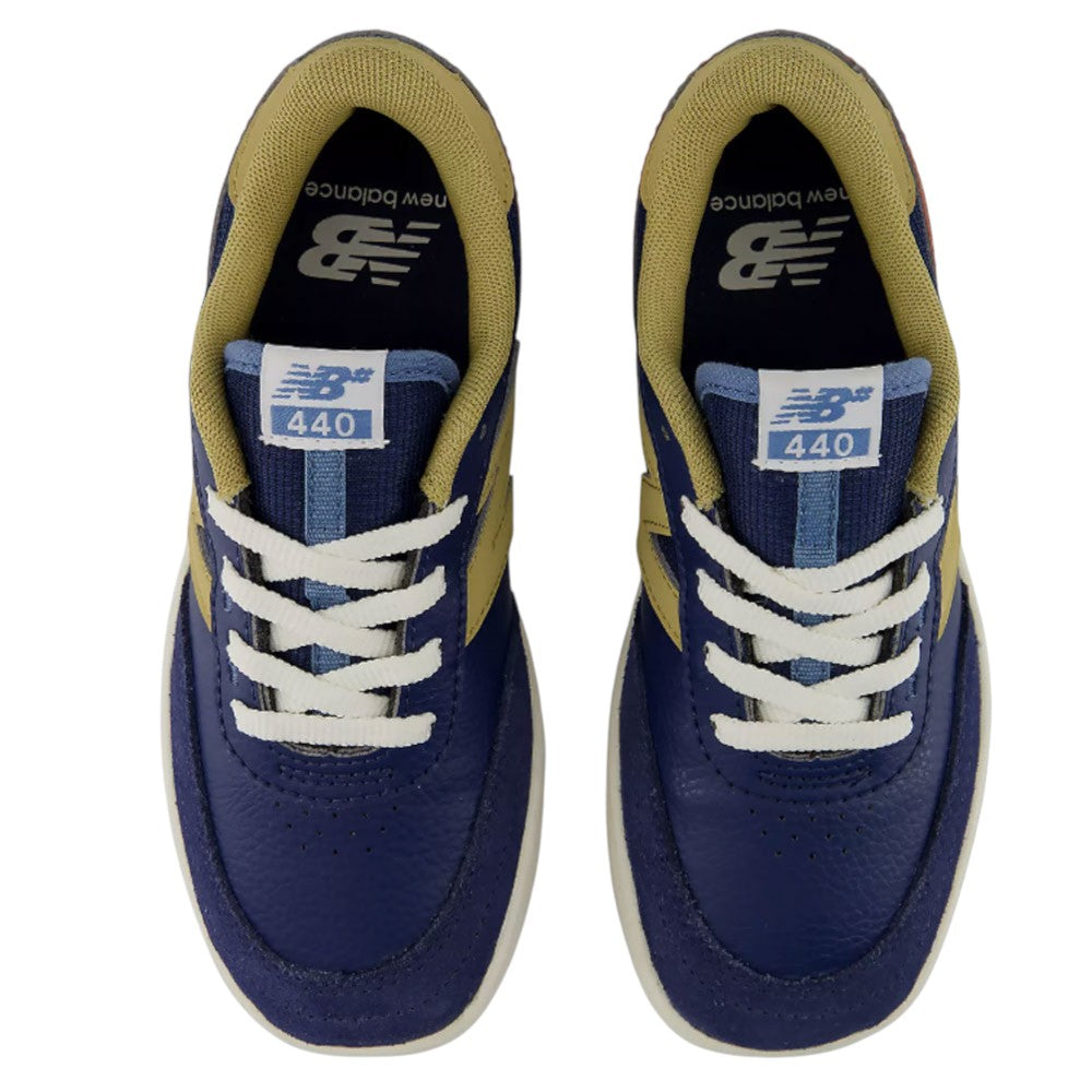 A pair of YOUTH 440 NVB New Balance Numeric Suede Skateboarding Shoes in blue and beige are viewed from above, showcasing their durable skate construction with reinforced toe caps, clearly displaying the laces, tongues, and New Balance logos on each shoe.
