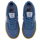 A pair of blue YOUTH Jamie Foy Cup 306 CAR New Balance Numeric Suede Skateboarding Shoes with gum soles, viewed from above. The tongues feature the Jamie Foy 306 label, showcasing these as durable skate shoes designed for the youth skate scene.