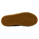 A brown rubber sole with a herringbone tread pattern and curved line detailing is shown from the bottom against a white background—engineered to provide the grip and durability needed for skateboarding, as featured on the YOUTH Jamie Foy Cup 306 CAR New Balance Numeric Suede Skateboarding Shoes.