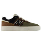 The YOUTH Jamie Foy Cup 306 TWY New Balance Numeric Suede Skateboarding Shoes feature a white sole, green suede toe, brown leather heel, black side panels, and a large white N logo—designed for durability and style as a kids skate shoe inspired by Jamie Foy.