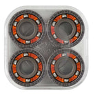 A clear plastic case containing four high-speed Zion Wright Pro 6 Ball RAW Bronson Speed Co. skateboard bearings, featuring orange and black detailing and arranged in a square formation. The shield-free design displays the text “BRONSON WRIGHT PRO RAW” on each bearing, engineered for optimal skate performance by Bronson Speed Co.