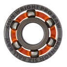 A metal ball bearing with orange spacers and engraved text on the outer ring reading “ZION WRIGHT PRO RAW BRONSON SIX BALL RAW,” these shield-free bearings are part of the Zion Wright Pro 6 Ball RAW Bronson Speed Co. Skateboard Bearings lineup, designed for high-speed skateboard performance.