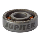 A close-up of a metal ball bearing with the word JUPITER engraved on its side. Inside the ring, some orange-colored ball bearings are visible, similar to those found in Zion Wright Pro 6 Ball RAW Bronson Speed Co. Skateboard Bearings.