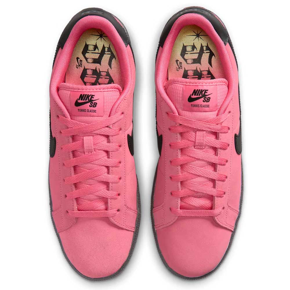 Top view of Zoom Tennis Classic IO8394600 Hyper Pink Black Nike SB leather skateboarding shoes with black Swoosh logos, black outsoles, and insoles featuring a unique black graphic on beige, highlighting Solarsoft insole comfort.