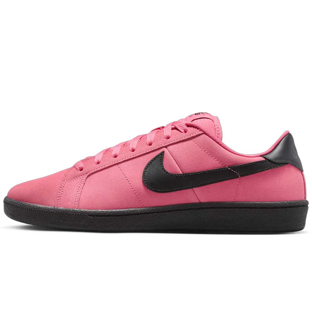 The Zoom Tennis Classic IO8394600 Hyper Pink Black Nike SB leather skateboarding shoe features a pink upper, black swoosh logo, black heel detail, and black rubber sole, shown side profile against a white background.