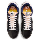 Top view of the Zoom Tennis Classic x Rassvet IO9846400 Blue Void Sail Nike SB leather skateboarding shoes with white laces and soles, peach tongue, blue lining, and Rassvet branding on the insole alongside Nike SB logos.