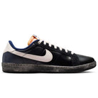 The Zoom Tennis Classic x Rassvet IO9846400 Blue Void Sail Nike SB leather skateboarding shoe features a blue upper, white swoosh logo, white laces, orange tongue detail, and a textured black and white rubber sole. Side profile on white background.