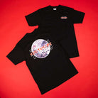 Two Kanji Southside Black Tees by Nguyen Duc Hien, both short-sleeved and 100% cotton, laid on a red surface; one has an oversized astronaut streetwear graphic with "SALT LYS," the other features a small chest logo.