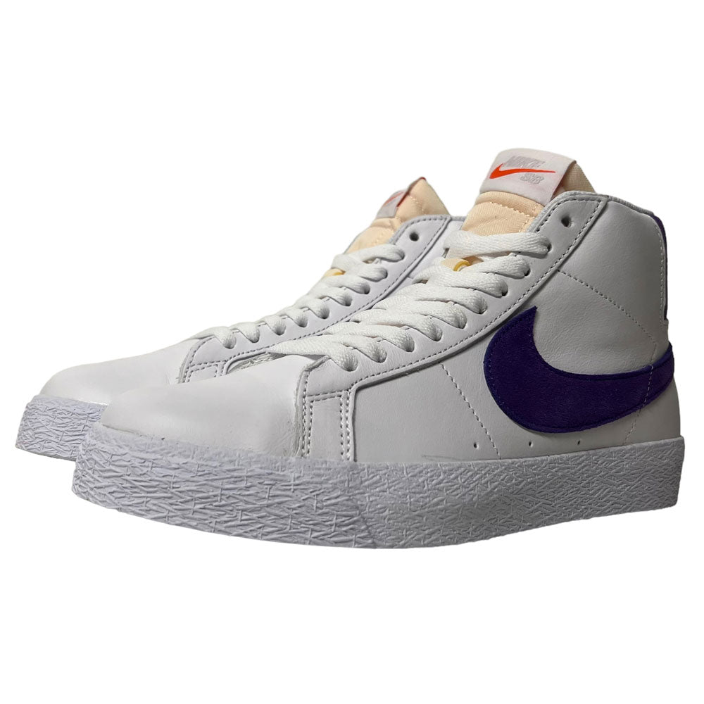 The DZ4949-100 Court Purple White Blazer Mid Nike SB Leather Skateboarding Shoes feature white leather, purple swooshes, white laces and soles, beige padded tongues with orange Nike logos—classic style perfect for skateboarding.