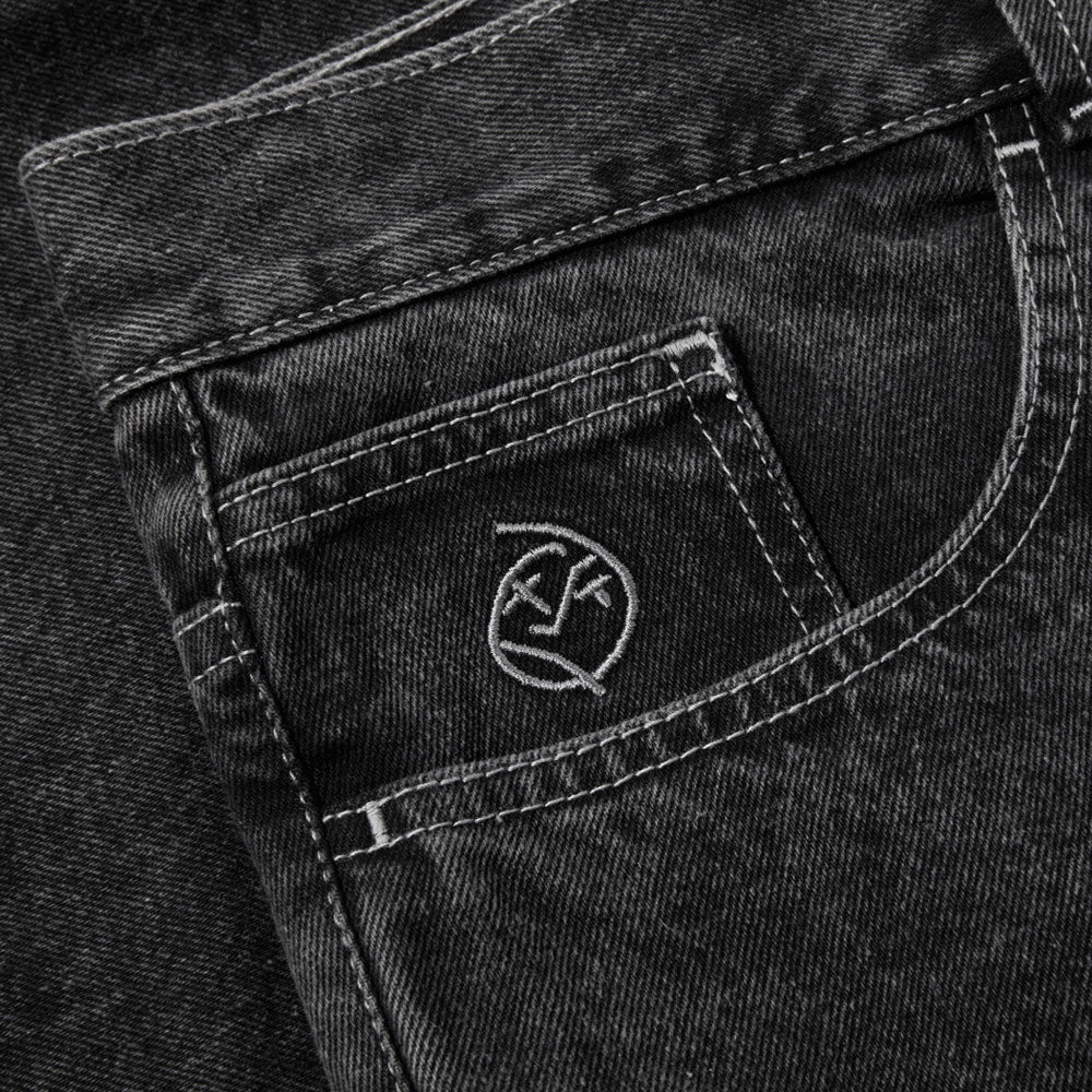 Close-up of the front pocket on Polar Big Boy Jeans Silver Black Denim, showing white stitching and an embroidered abstract face on the small coin pocket.