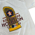 The Southside 94 Tee White Houston Trophy features a gold trophy, a star with an “S,” and “Southside Houston 1994” text above an MLB logo on a white t-shirt.