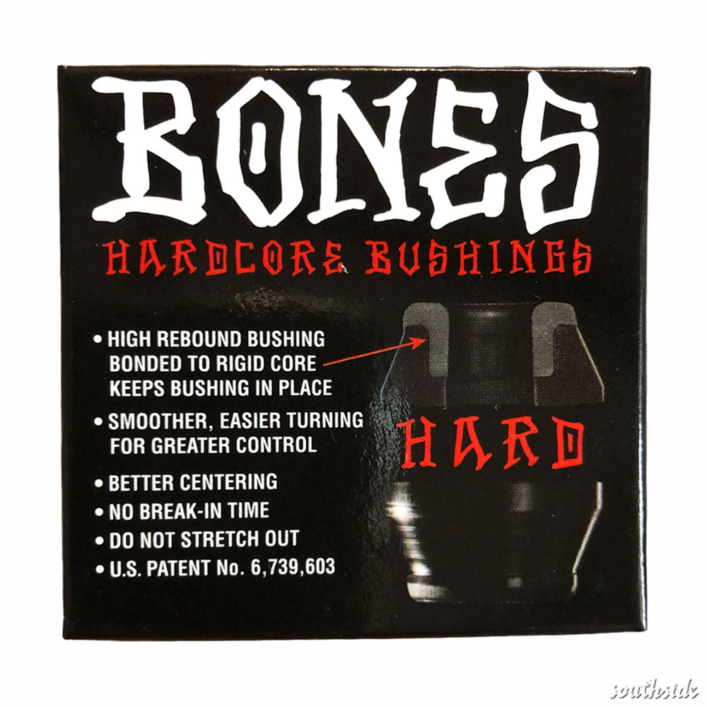 A black box of Bones Hardcore Bushing Hard Black with bold white and red text highlights high rebound, smooth turning, better centering, no break-in time, and no stretching. "HARD" is emphasized in red.